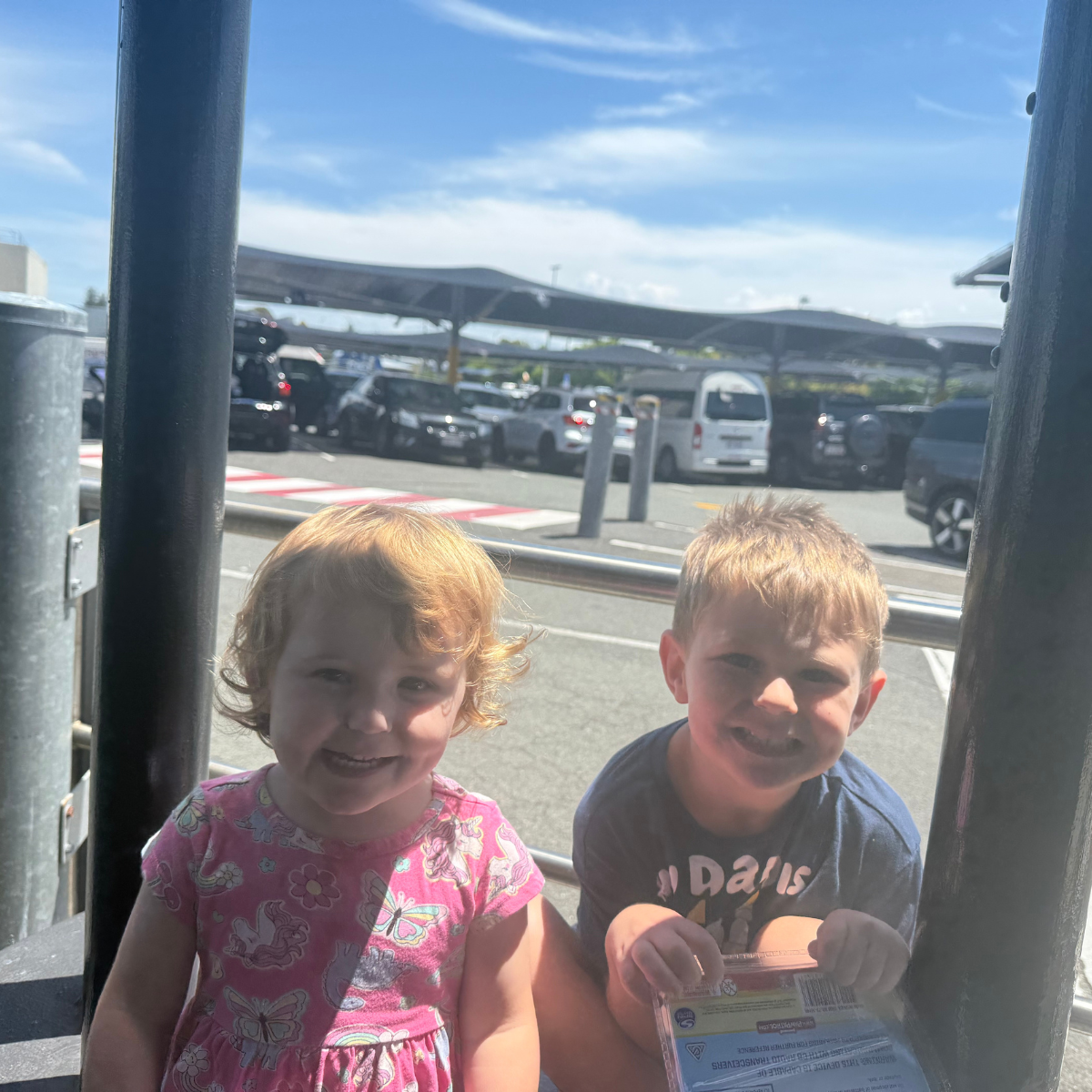 Jon recreating his childhood Caloundra Shopping Centre photo with his children